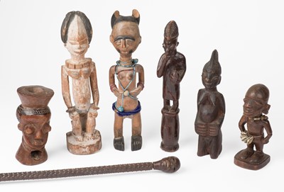 Lot 473 - Tribal Art. An African hardwood walking stick, probably late 19th century and figures