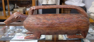 Lot 474 - Tribal Art. An African zoomorphic carved wood box