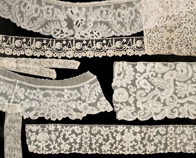 Lot 303 - Brabant. A flounce of bobbin lace, Belgium, circa 1750, & other 18th & 19th century Belgium lace