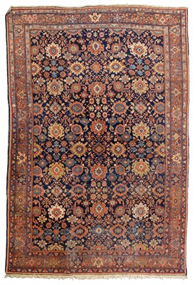 Lot 265 - Carpets. A large Oriental Bochara woollen carpet, 20th century, and two others