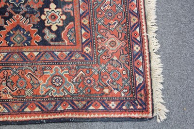 Lot 265 - Carpets. A large Oriental Bochara woollen carpet, 20th century, and two others