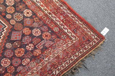 Lot 265 - Carpets. A large Oriental Bochara woollen carpet, 20th century, and two others