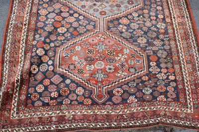 Lot 265 - Carpets. A large Oriental Bochara woollen carpet, 20th century, and two others