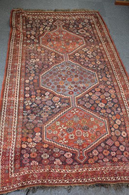 Lot 265 - Carpets. A large Oriental Bochara woollen carpet, 20th century, and two others