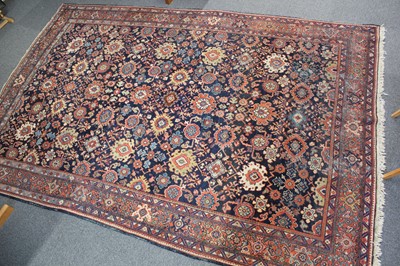 Lot 265 - Carpets. A large Oriental Bochara woollen carpet, 20th century, and two others