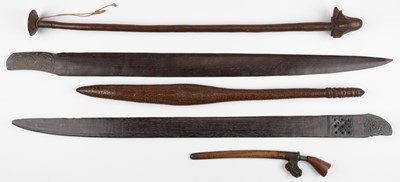 Lot 469 - Tribal art. An Aboriginal hardwood club and other items
