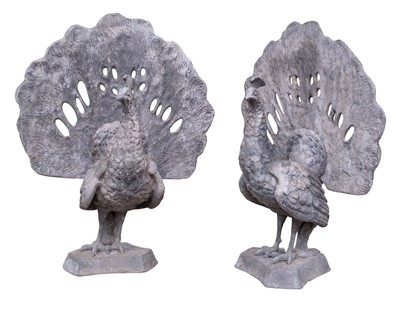 Lot 420 - Peacocks. A substantial pair of lead garden statues modelled as peacocks