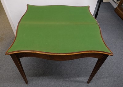 Lot 445 - Table. A George III mahogany games table