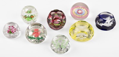 Lot 399 - Paperweights. A collection of glass paperweights