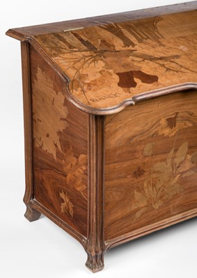 Lot 437 - Emile Gallé (1846-1904). A carved and inlaid walnut chest