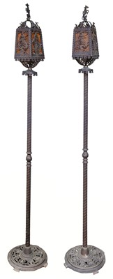 Lot 424 - Standard lamps. A pair of Continental iron work standard lamps, early 20th century