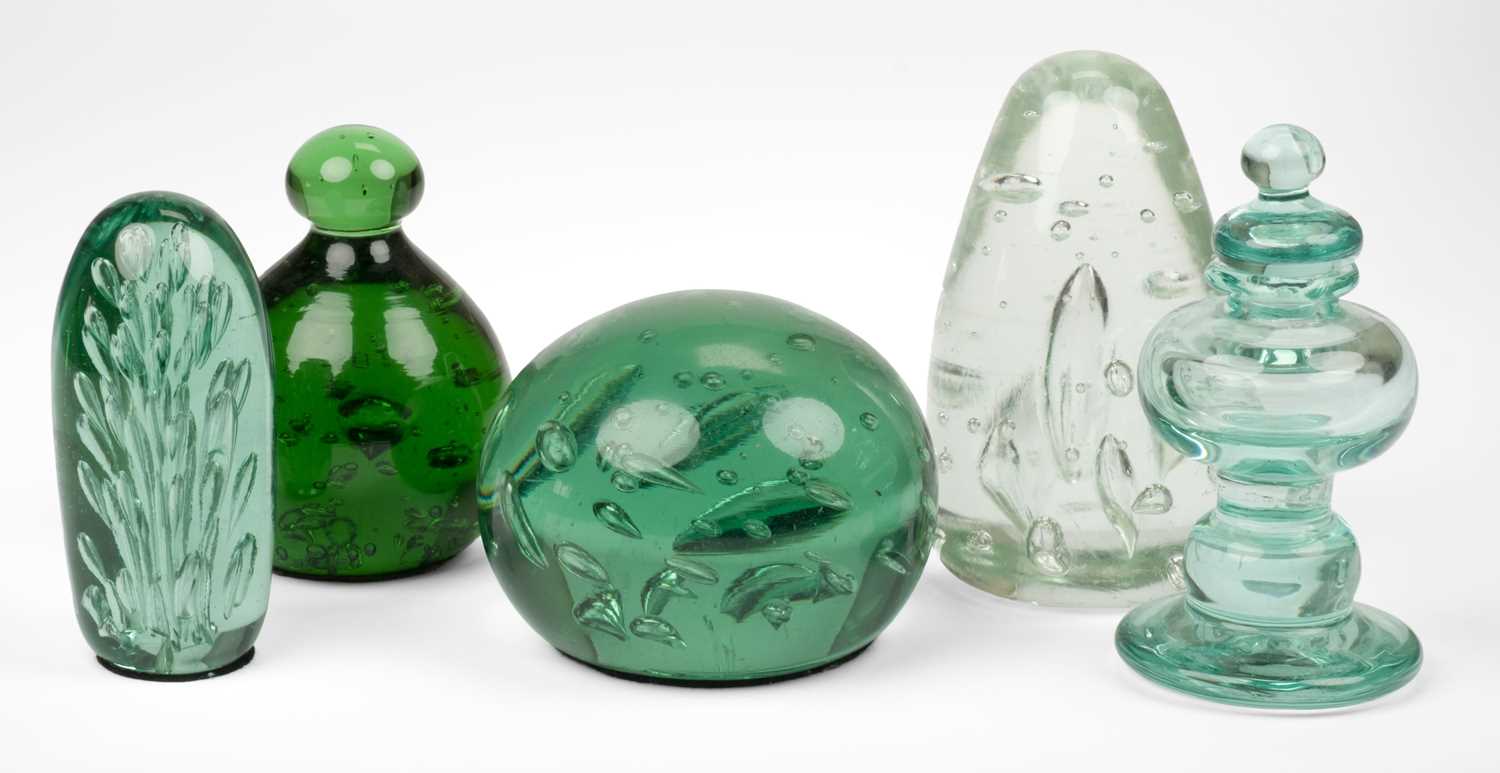 Lot 401 - Paperweights. A large collection of Victorian green glass dump paperweights