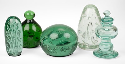 Lot 401 - Paperweights. A large collection of Victorian green glass dump paperweights
