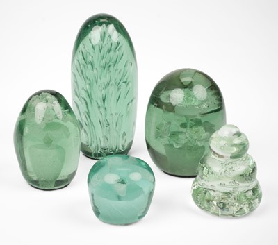 Lot 402 - Paperweights. A large collection of Victorian green glass dump paperweights