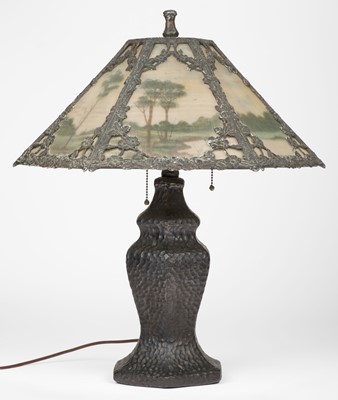 Lot 425 - Table lamp. An Art Nouveau painted metal and painted glass table lamp, circa 1910