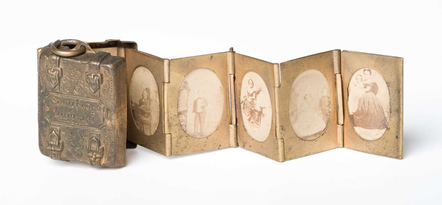 Lot 513 - Tom Thumb. Somebody's Luggage miniature locket photograph album, [New York, 1863]