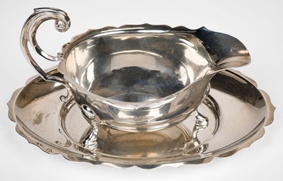 Lot 412 - Sauceboat. A George V silver sauceboat by Viner's Ltd, Sheffield, 1931 and tray