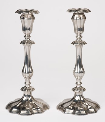 Lot 533 - Pitt family. A pair of Victorian silver-plated candlesticks