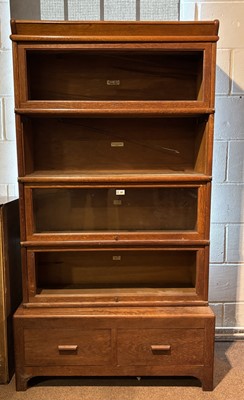 Lot 308 - Bookcase. A 1920s oak bookcase by P. E. Gane, Cardiff