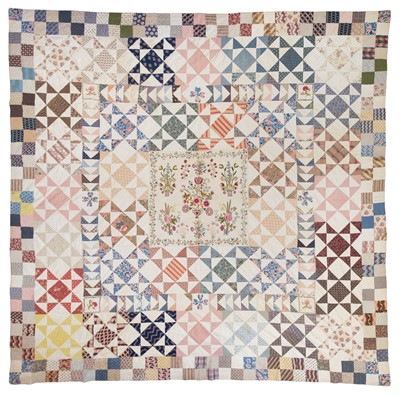 Lot 340 - Quilt. A large embroidered patchwork coverlet, early 19th century