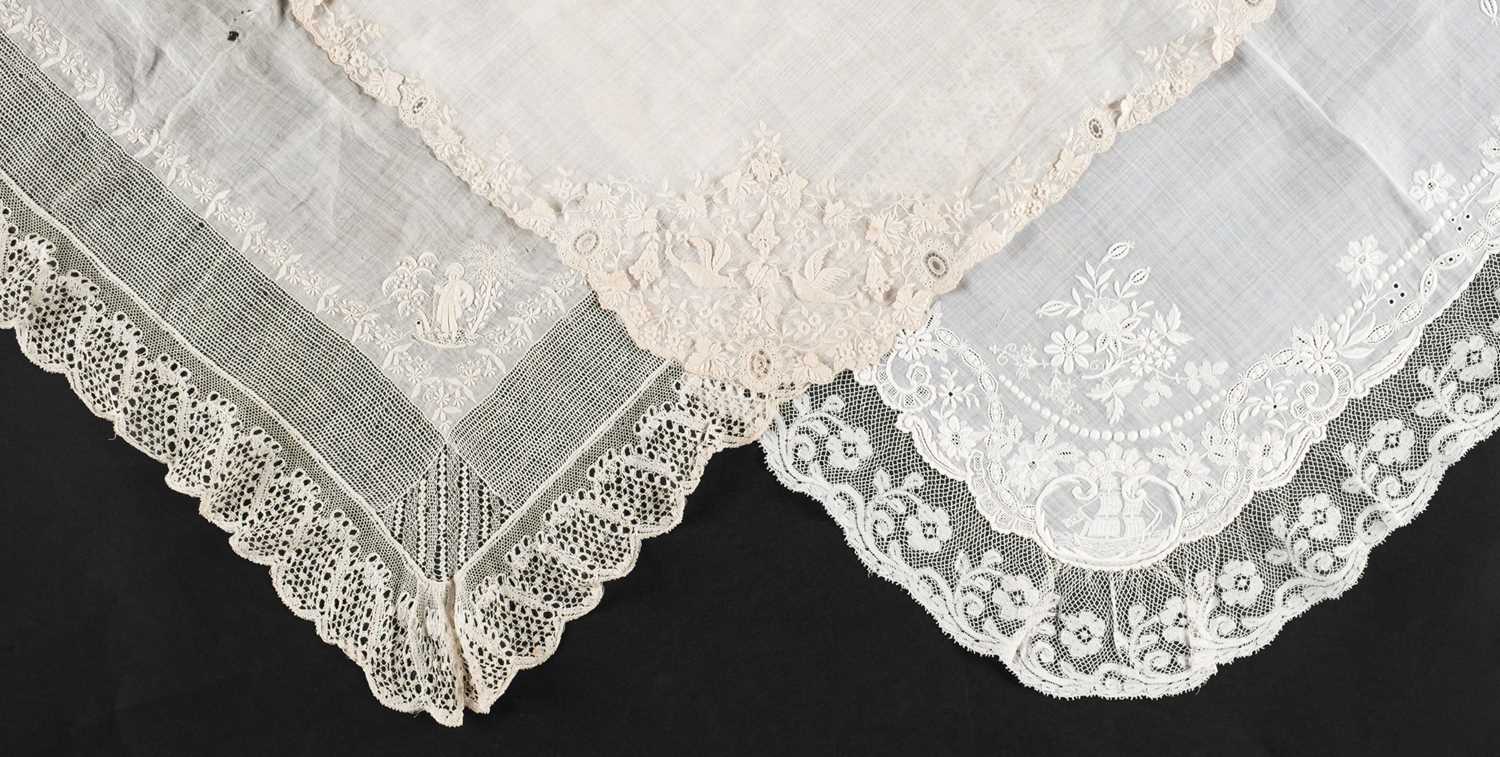 Lot 325 - Handkerchief. A whitework lace handkerchief, late 18th century, & 2 others