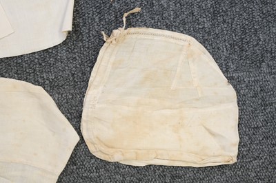 Lot 292 - Children's Clothing. A rare early infant's dress, 18th century, & 4 18th century bonnets