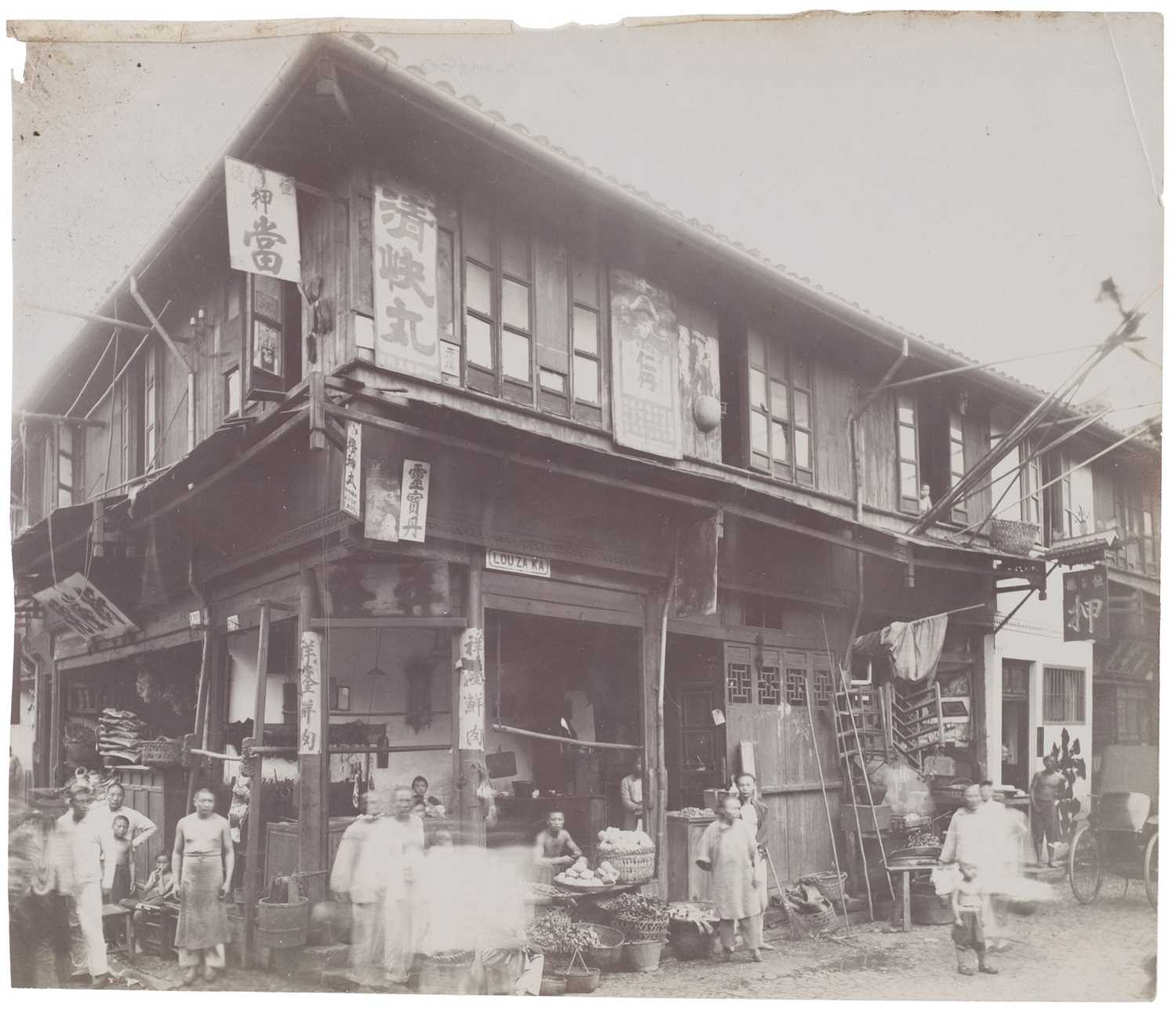Lot 8 - China. A group of 8 photographs of Chinese street and market scenes, c. 1900-1910