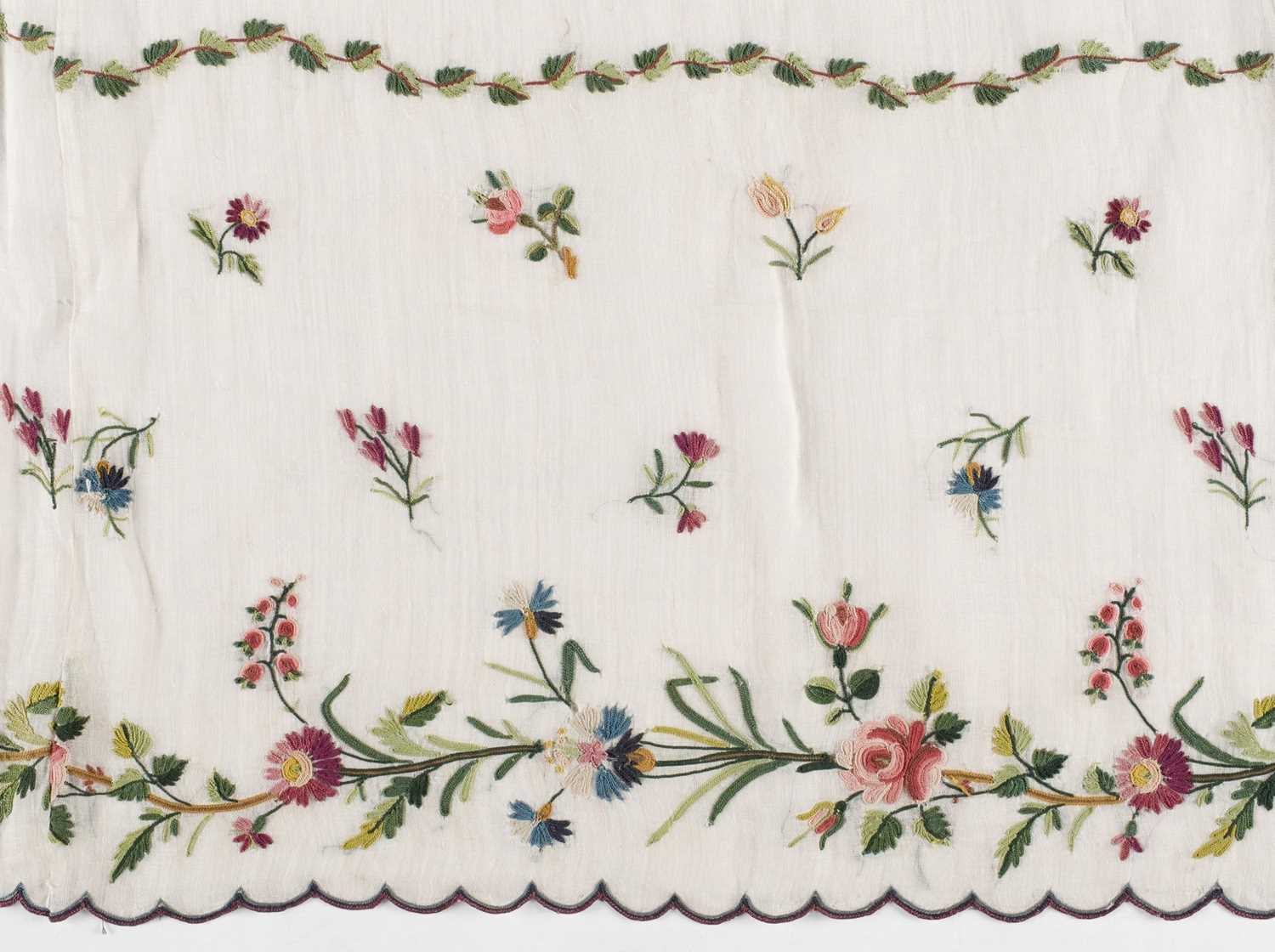 Lot 310 - Embroidered Skirt. A Regency needlework muslin skirt, circa 1810, & 2 others