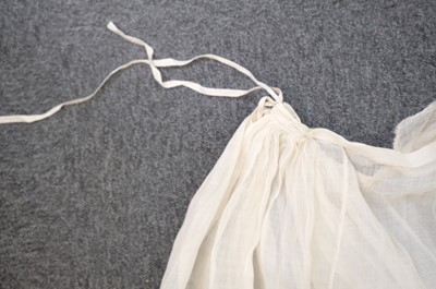 Lot 310 - Embroidered Skirt. A Regency needlework muslin skirt, circa 1810, & 2 others