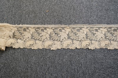 Lot 334 - Milanese Lace. A length of lace, Italy, 19th century, & others