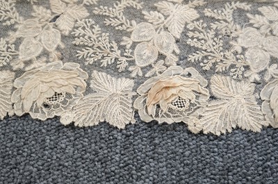 Lot 334 - Milanese Lace. A length of lace, Italy, 19th century, & others