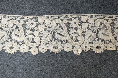 Lot 334 - Milanese Lace. A length of lace, Italy, 19th century, & others