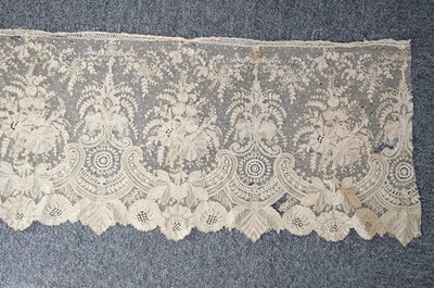 Lot 334 - Milanese Lace. A length of lace, Italy, 19th century, & others