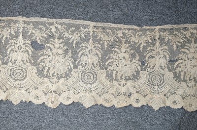 Lot 334 - Milanese Lace. A length of lace, Italy, 19th century, & others