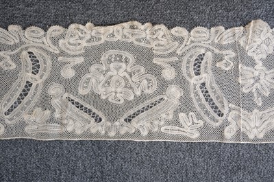 Lot 334 - Milanese Lace. A length of lace, Italy, 19th century, & others