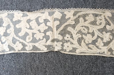 Lot 334 - Milanese Lace. A length of lace, Italy, 19th century, & others
