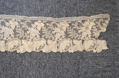 Lot 334 - Milanese Lace. A length of lace, Italy, 19th century, & others