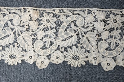 Lot 334 - Milanese Lace. A length of lace, Italy, 19th century, & others