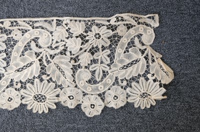 Lot 334 - Milanese Lace. A length of lace, Italy, 19th century, & others