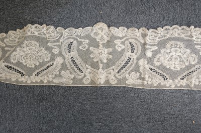 Lot 334 - Milanese Lace. A length of lace, Italy, 19th century, & others