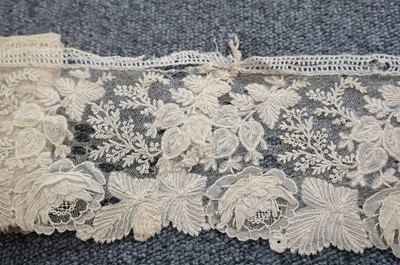 Lot 334 - Milanese Lace. A length of lace, Italy, 19th century, & others