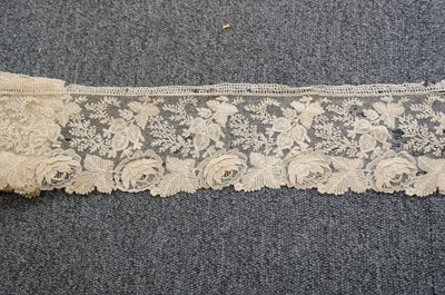 Lot 334 - Milanese Lace. A length of lace, Italy, 19th century, & others
