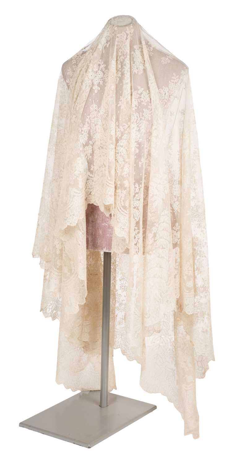 Lot 332 - Lace Veil. A needlelace wedding veil, late 19th/early 20th century, & other lace items