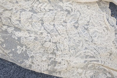 Lot 332 - Lace Veil. A needlelace wedding veil, late 19th/early 20th century, & other lace items