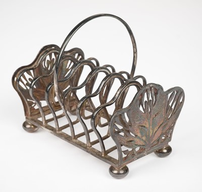 Lot 421 - Toast rack. An Arts and Crafts style silver toast rack by the Guild of Handicraft currently known as Hart Gold & Silversmiths, London, 1995