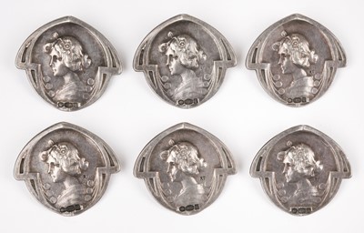Lot 390 - Buttons. A set of six Arts and Crafts silver buttons