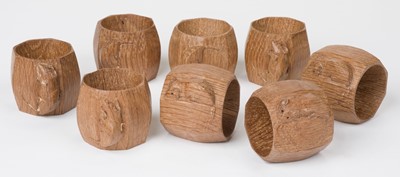Lot 496 - Mouseman. Workshop of Robert Mouseman Thompson (Kilburn), a set of 8 carved oak napkin rings