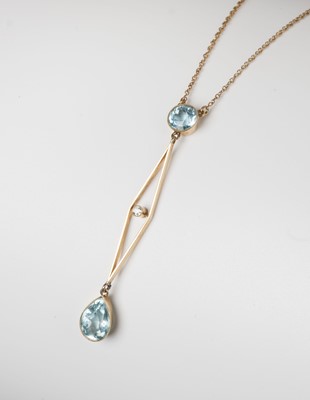 Lot 451 - Pendant. An art deco style 15ct gold openwork pendant and chain