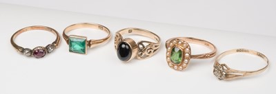Lot 452 - Rings. An Edwardian 15ct gold emerald and pearl ring