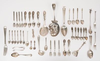 Lot 400 - Continental silver. A mixed collection of spoons, forks and servers